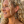 Load image into Gallery viewer, Woman wearing gold hexagonal earrings with a blurred natural background
