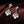 Load image into Gallery viewer, Pearl and crystal drop earrings on a brown fabric background
