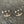 Load image into Gallery viewer, Jewelry items including earrings and a necklace on a textured surface
