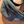 Load image into Gallery viewer, blue waist bag on a wooden surface
