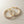 Load image into Gallery viewer, Gold hoop earrings with gemstones on a light wooden surface
