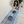 Load image into Gallery viewer, Dog standing on a blue and white striped mat with two bowls, in a home setting.
