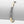 Load image into Gallery viewer, Gold and silver bracelet with intricate design on a gray surface
