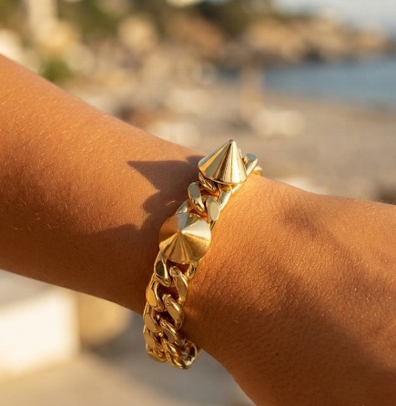 Bold Gold-Tone Cuban Link Bracelet with Pyramid Studs