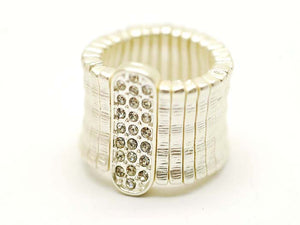 Gold ring with diamond accents on a white background