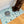 Load image into Gallery viewer, Dog drinking from a bowl on a terrazzo-patterned mat with 'unikook' branding.
