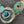 Load image into Gallery viewer, Close-up of a decorative bracelet with turquoise stones on a dark surface
