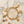Load image into Gallery viewer, Gold charm bracelet on a marble surface
