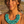 Load image into Gallery viewer, Woman wearing a turquoise necklace outdoors with a blurred natural background
