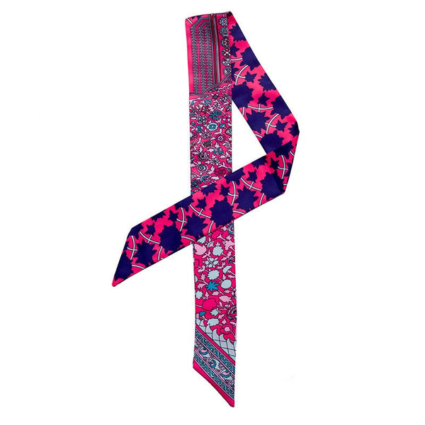 Decorative scarf with pink and blue pattern on a white background
