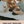 Load image into Gallery viewer, Two children sitting on a mat outdoors with a basket of items, text overlay 'One Mat, Endless Memories'.
