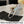 Load image into Gallery viewer, Baby changing mat with a bag containing diapers and wipes on a bed.
