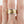 Load image into Gallery viewer, Gold and silver ring on a finger against a white background
