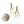 Load image into Gallery viewer, Gold earrings with pearl-like beads next to a quarter on a white background
