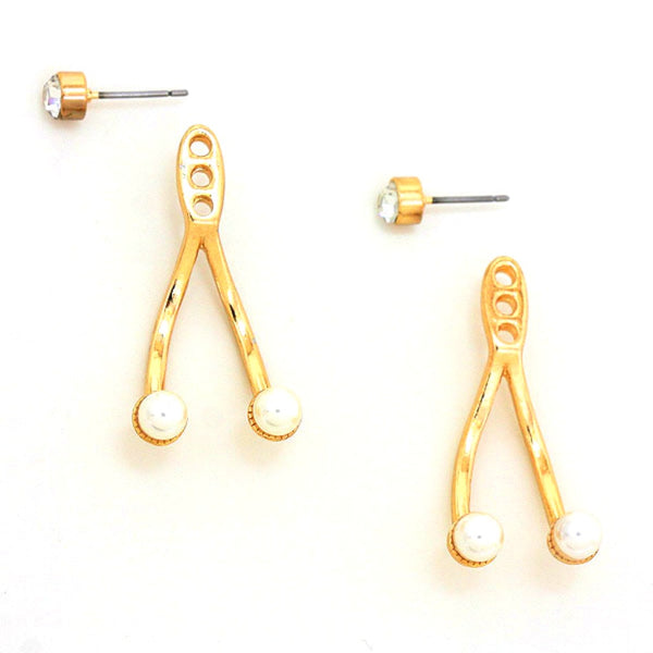 Gold earrings with pearl-like beads on a white background