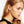 Load image into Gallery viewer, Close-up of a woman wearing earrings with a plain background
