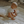 Load image into Gallery viewer, Baby sitting on a mattress with text about durable utility design
