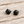 Load image into Gallery viewer, Black cube cubic zirconia stud earrings on pale barn wood
