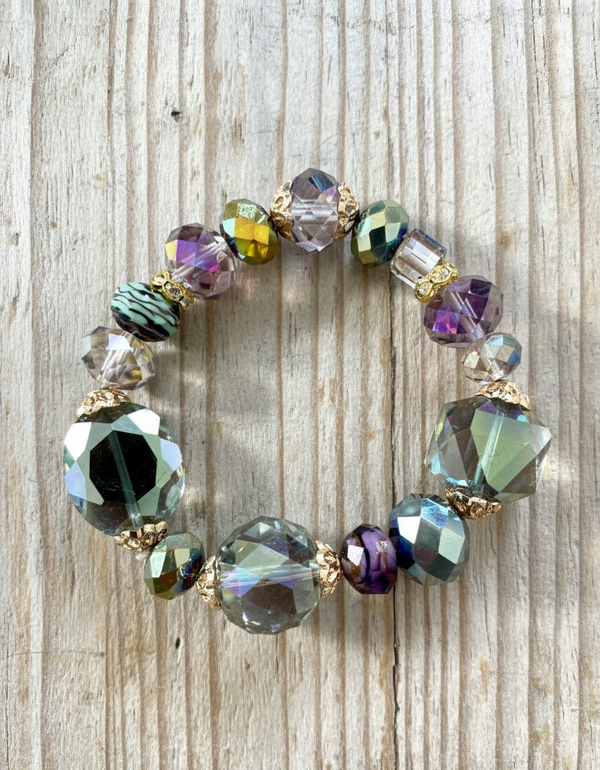 Multicolored beaded bracelet on a wooden surface