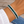 Load image into Gallery viewer, Emerald green crystal tennis bracelet worn on a tanned wrist
