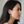 Load image into Gallery viewer, Woman wearing a pair of earrings with a neutral background
