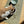 Load image into Gallery viewer, Cat eating from a bowl on a 'uniklook' mat with water bowl in the background
