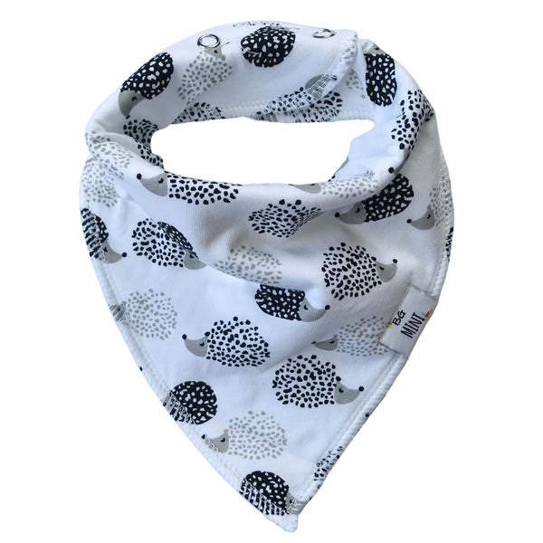 Baby bib with hedgehog pattern on a white background