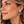 Load image into Gallery viewer, Rainbow crystal fan earrings worn by a woman
