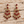 Load image into Gallery viewer, Ruby red rhinestone chandelier earrings on pale barnwood
