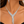Load image into Gallery viewer, Silver crystal cascading statement necklace and matching earrings worn by a woman
