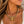 Load image into Gallery viewer, Gold spider necklace worn on a tanned model
