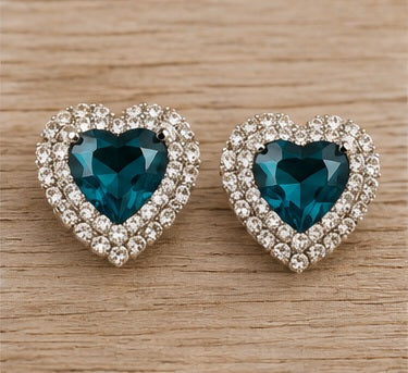 Matching teal heart earrings front view