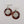 Load image into Gallery viewer, Original angled view of brown tortoiseshell-style earrings and post-back closure
