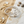 Load image into Gallery viewer, Silver bracelet with pearls on a marble surface with sand and shells in the background
