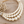 Load image into Gallery viewer, Cream three strand pearl necklace on pale rustic wood
