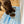 Load image into Gallery viewer, Dog eating from a bowl on a blue and white striped mat
