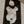 Load image into Gallery viewer, Baby lying on a black mat with a neutral background
