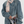 Load image into Gallery viewer, Person wearing a denim jacket and holding a clutch with a white background
