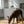 Load image into Gallery viewer, Dog eating from a bowl on a wooden floor in a bright kitchen.
