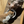 Load image into Gallery viewer, Two cats, one with a shaved head, eating from a bowl on a mat.
