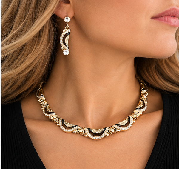 Woman wearing vintage gold and black choker necklace