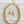 Load image into Gallery viewer, A gold-tone chunky chain necklace and matching drop earrings displayed on a light gray wood plank background.
