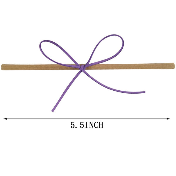 Sleek suede knot bow
